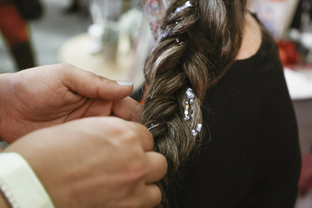 BottleRock Napa Valley Photography of C-Love Team Hair Stylist Braiding Hair with Glitter by Amarie Design Co.